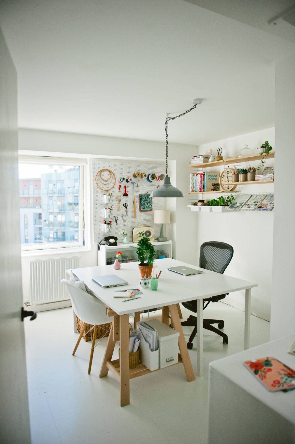 Desk that offers ample workspace while hiding the clutter for the home office