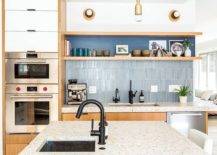 Fabulous-mid-century-modern-kitchen-in-white-with-blue-vertical-tile-backsplash-79771-217x155