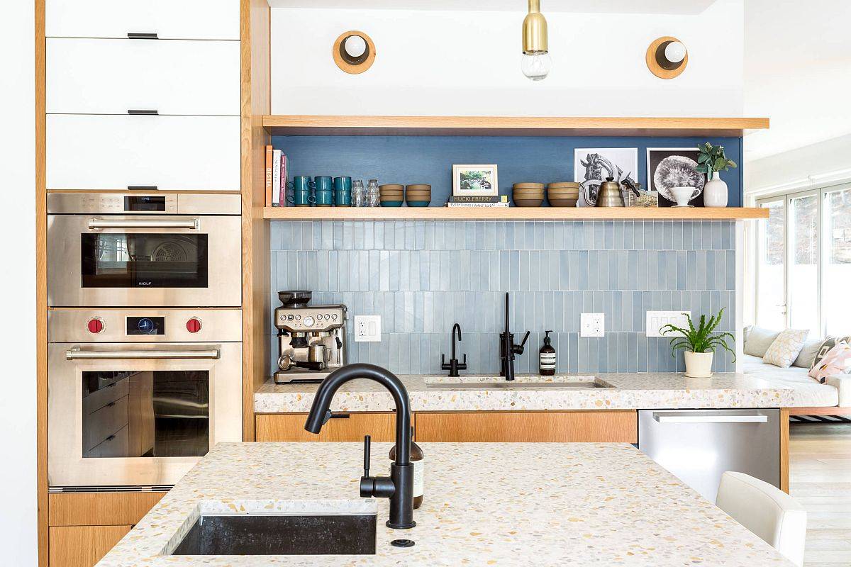 Fabulous mid-century modern kitchen in white with blue vertical tile backsplash