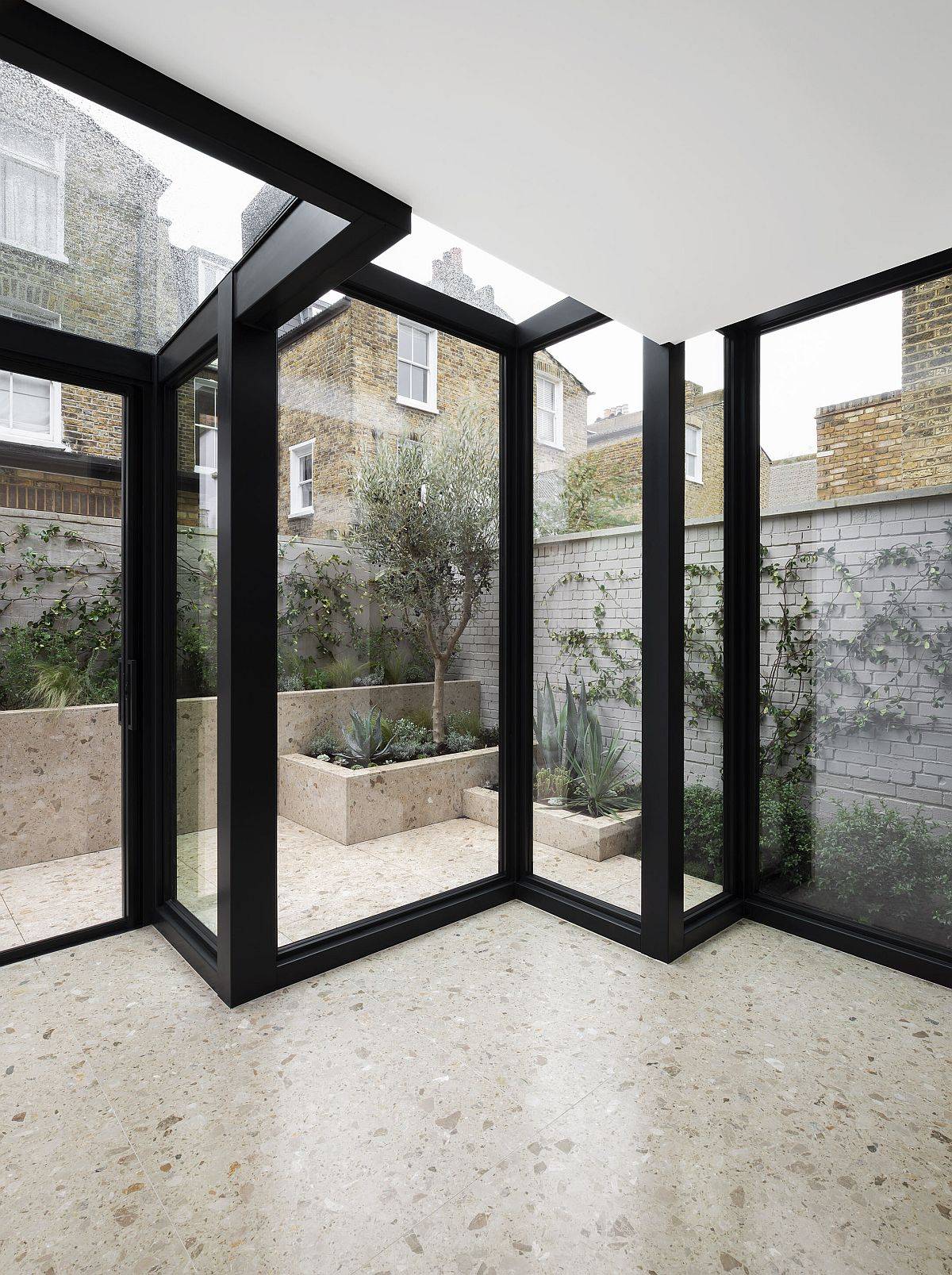 Glass-boxes-with-metal-frame-extend-the-traditional-home-in-a-creative-manner-71628