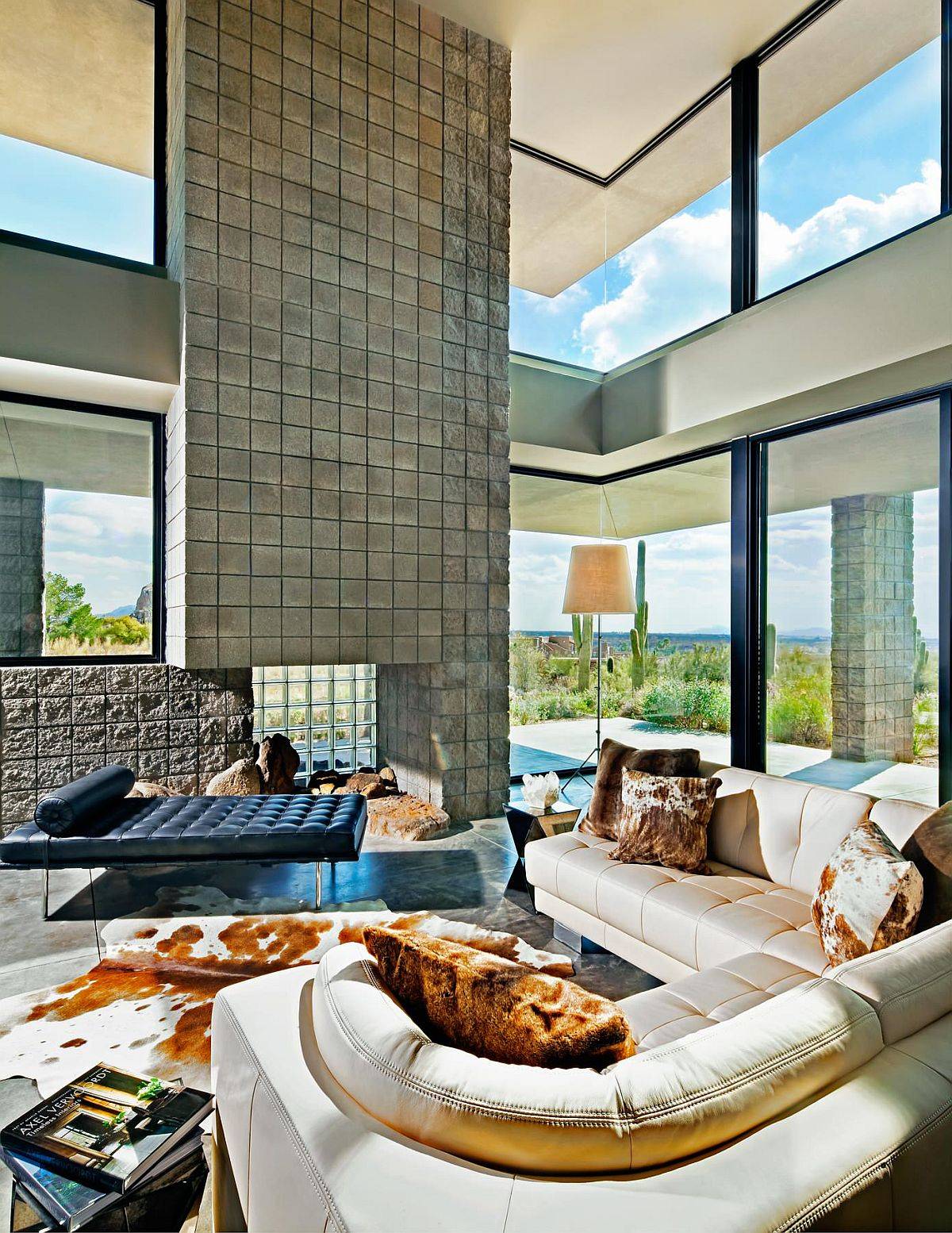 Inventive and open living room where glass makes pplenty of impact!