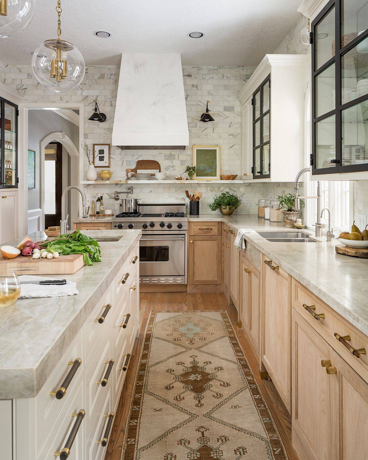 Modern kitchen revamp in white and wood with smart placement of appliances and sink