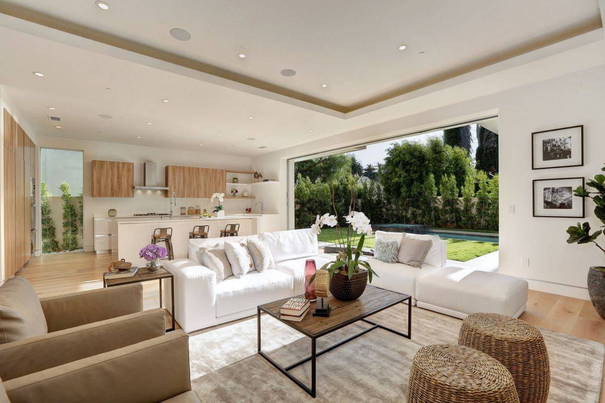 Sliding glass doors bring greenery in the living room