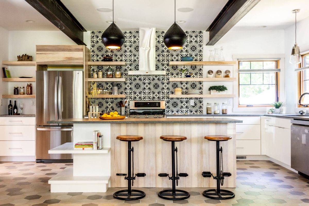 Slim floating shelves instead of upper cabinets give the small kitchen a spacious look