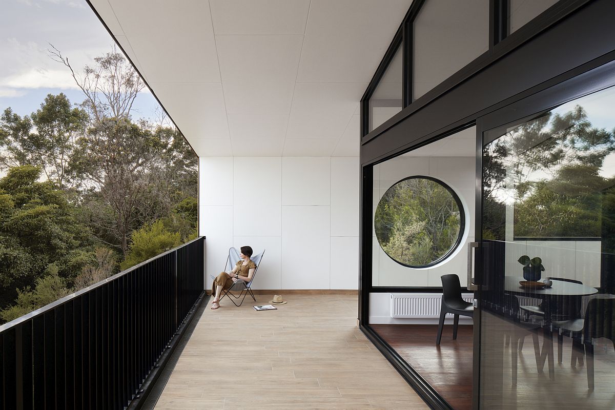 Sloped design of the home allows those inside to take in the many treetop and water views