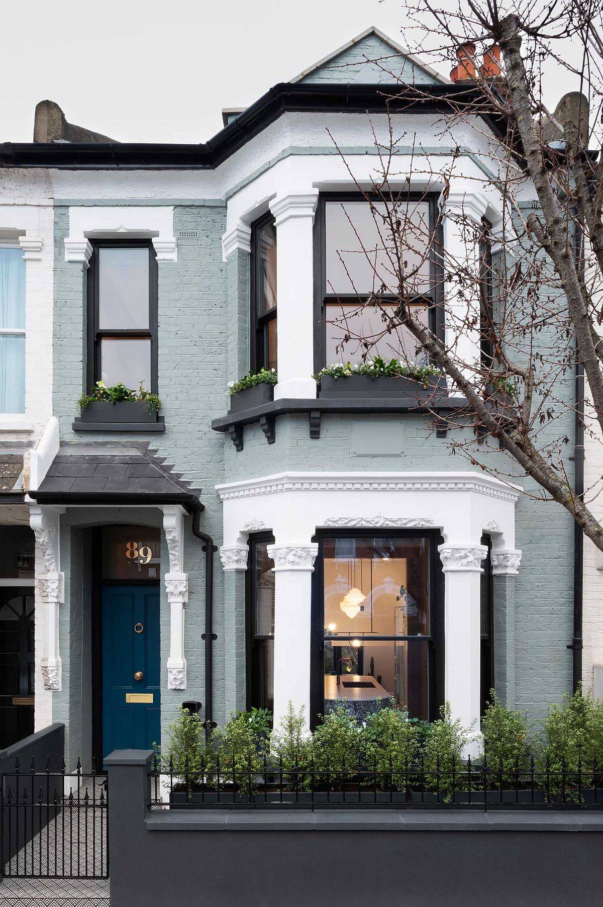 Street facade of the renovated and extended Victorian house in London