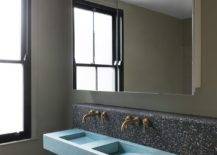 Terrazzo-floor-and-tiles-in-the-bathroom-continue-the-theme-of-the-home-renovation-59293-217x155