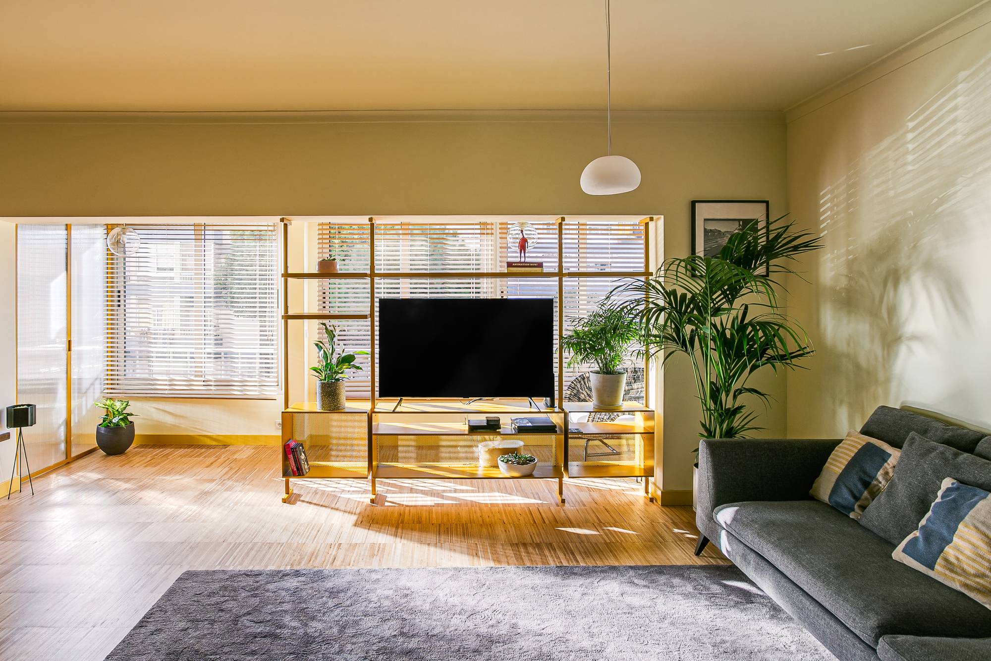 Using the TV wall to delineate space in the open-plan living area