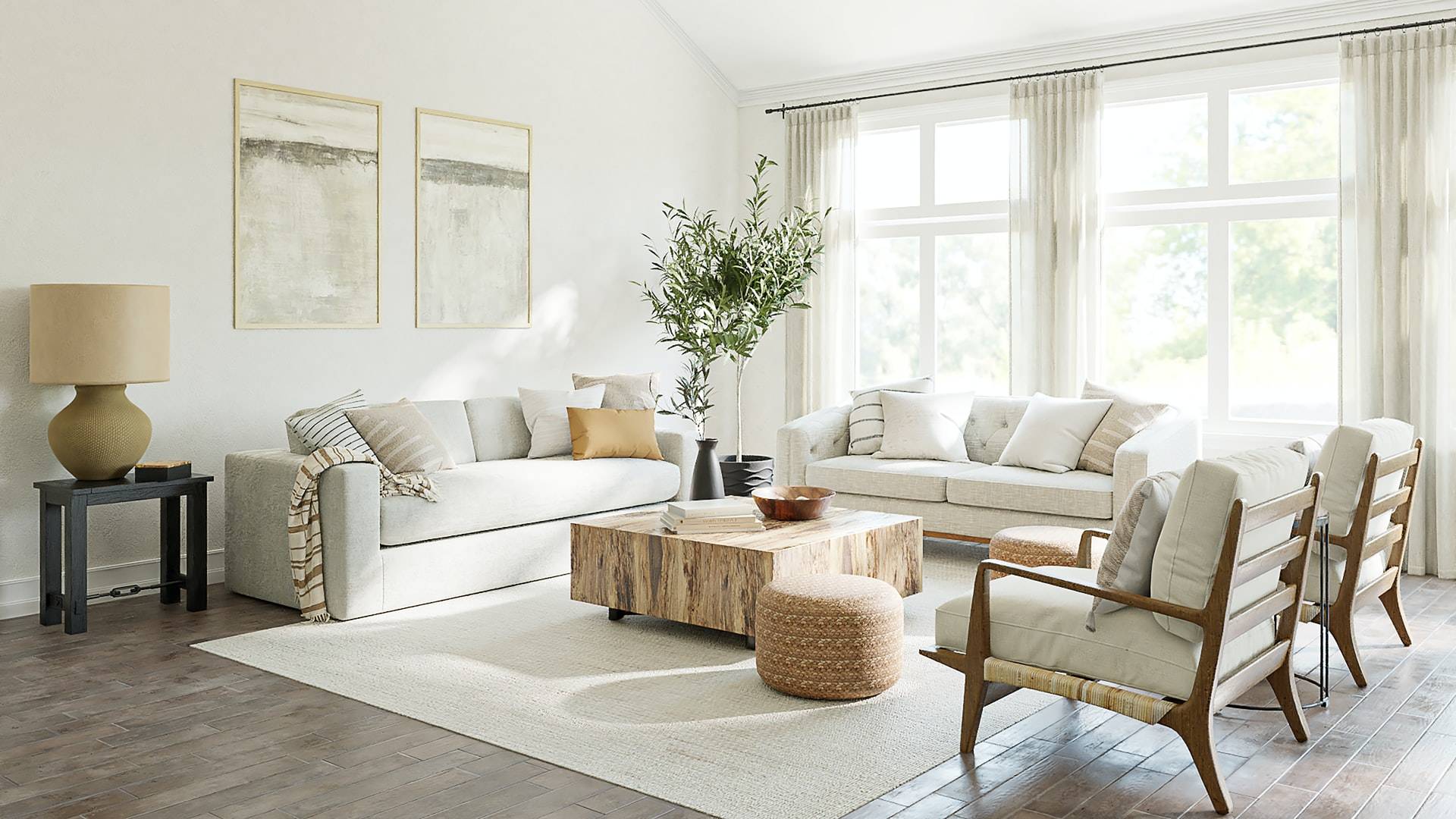 cozy living room with two white couches, wooden coffee table and accent chairs