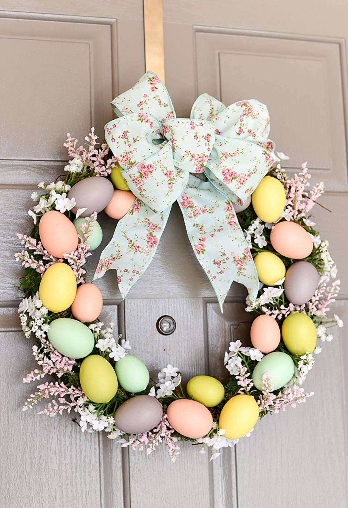 Easter egg wreath on the front door is a must (from Country Living)