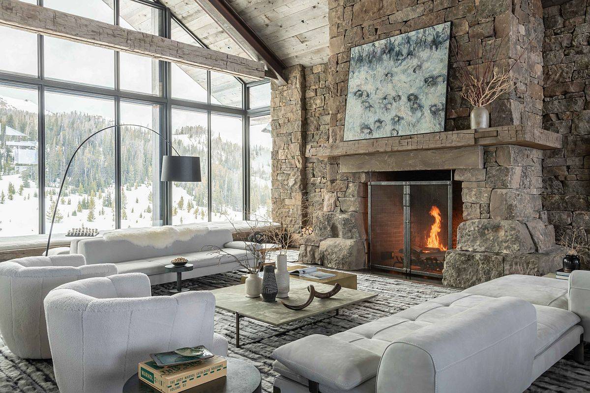 Classic mountain-cabin look coupled with a gorgeous stone fireplace in the rustic living room