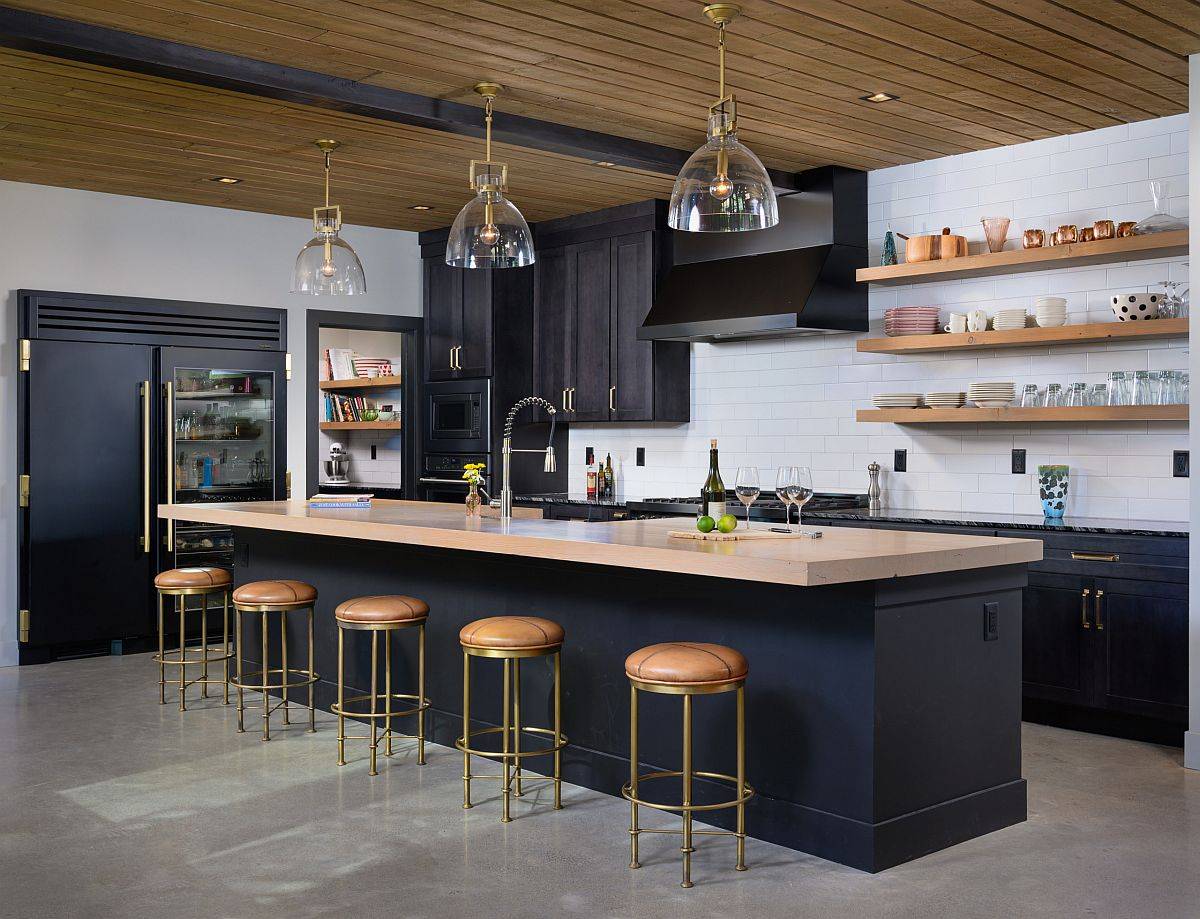 Deep gray and wood kitchen island adds to the color palette of the kitchen