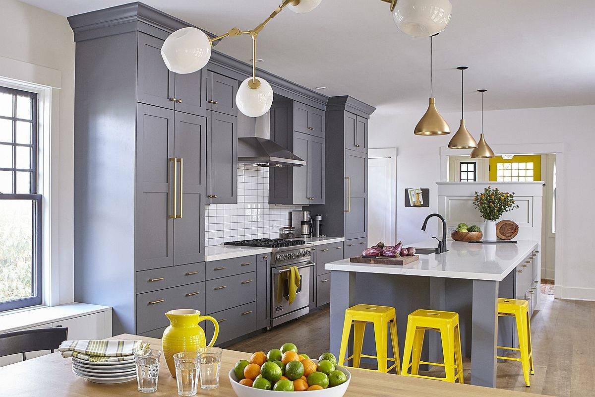 Exquisite kitchen in white and gray with splashes of yellow thrown around