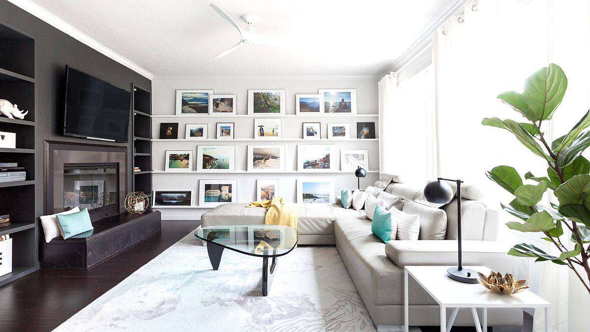 Eye-catching gallery wall in the living room is just perfect for a rental home