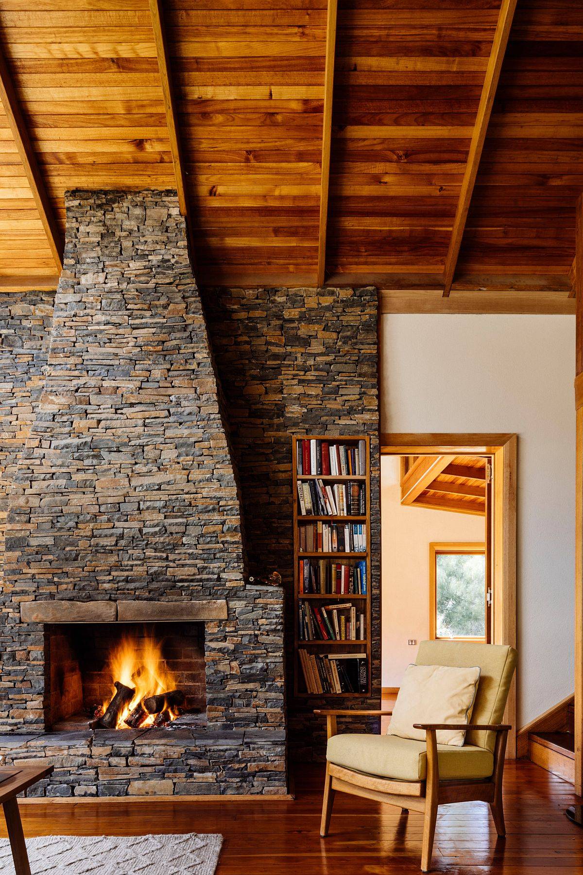 Natural stone fireplace is a great addition in any rustic living space