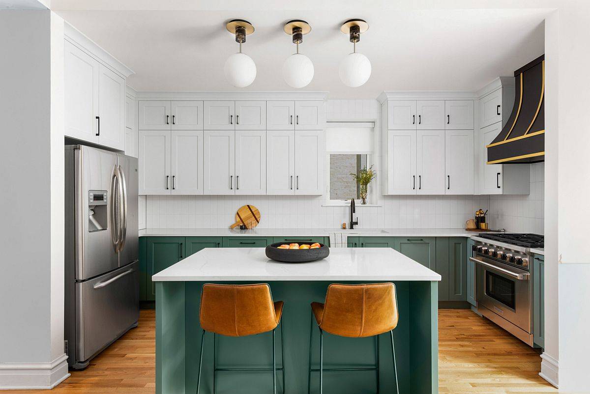 Polished contemporary kitchen in white with captivating island in deep green along with green cabinets