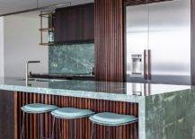 Repeating-the-stone-used-for-the-backplash-in-the-kitchen-to-create-smart-countertops-77068-217x155