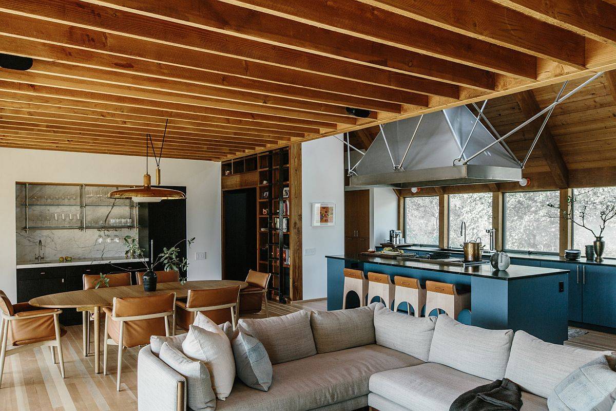 Woodsy ceiling brings rustic touches to this modern living room