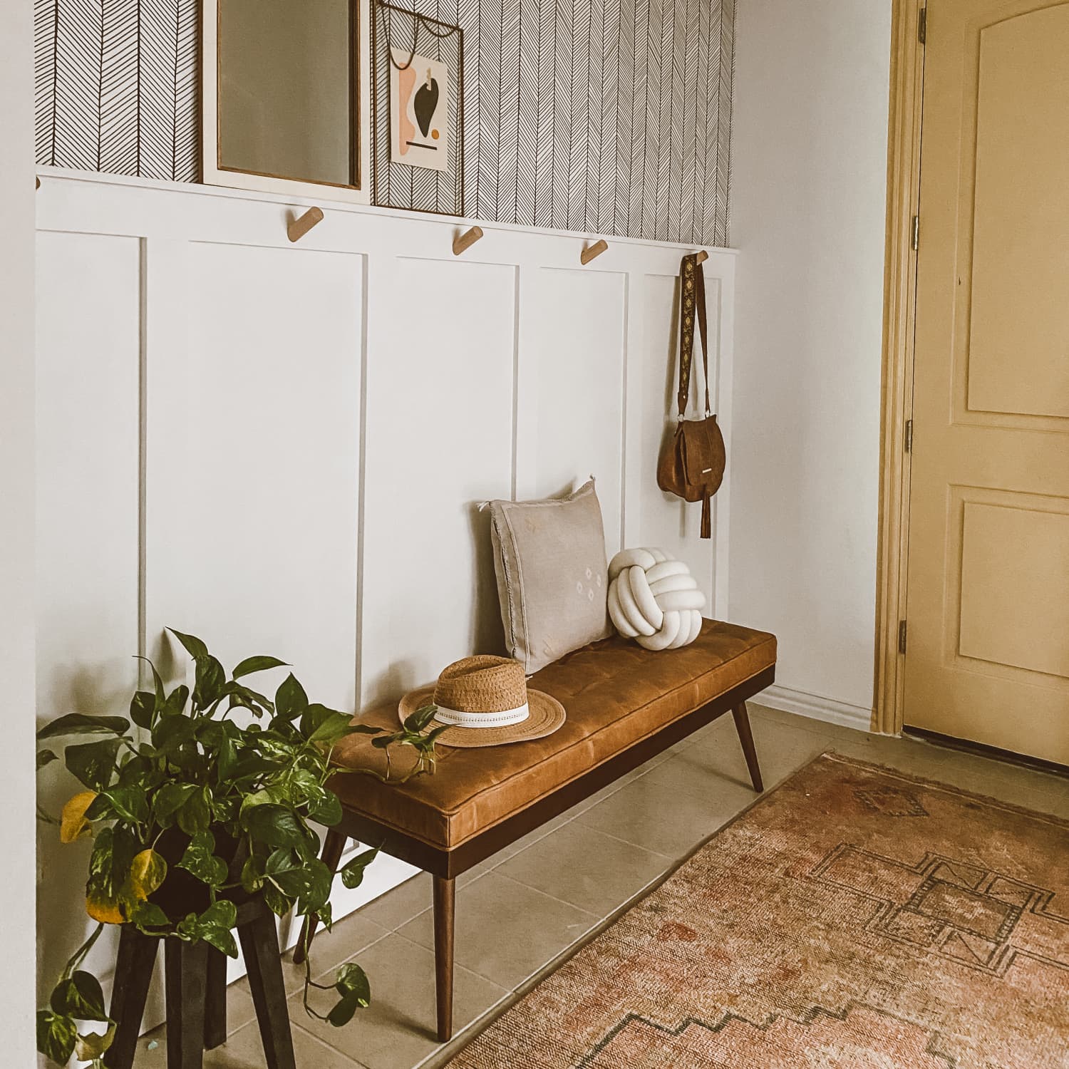 Stylish and modern small entryway (from  Lacy Hoysradt)