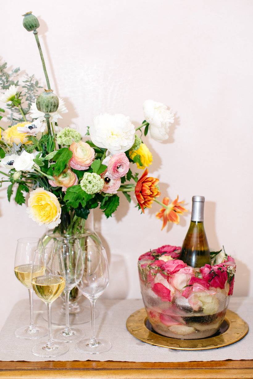 Ice drink bucket as a centerpiece (from Camille Styles)