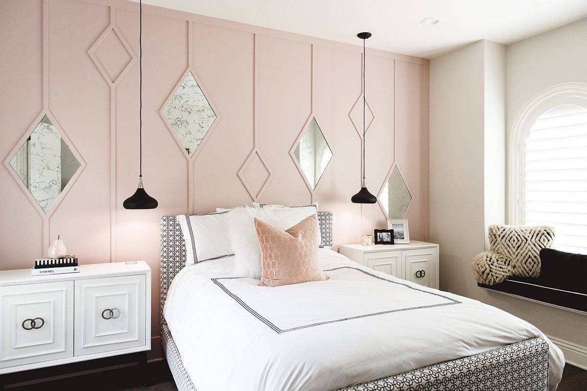 Beautiful pink bedroom with a custom geo accent wall unlike any other!