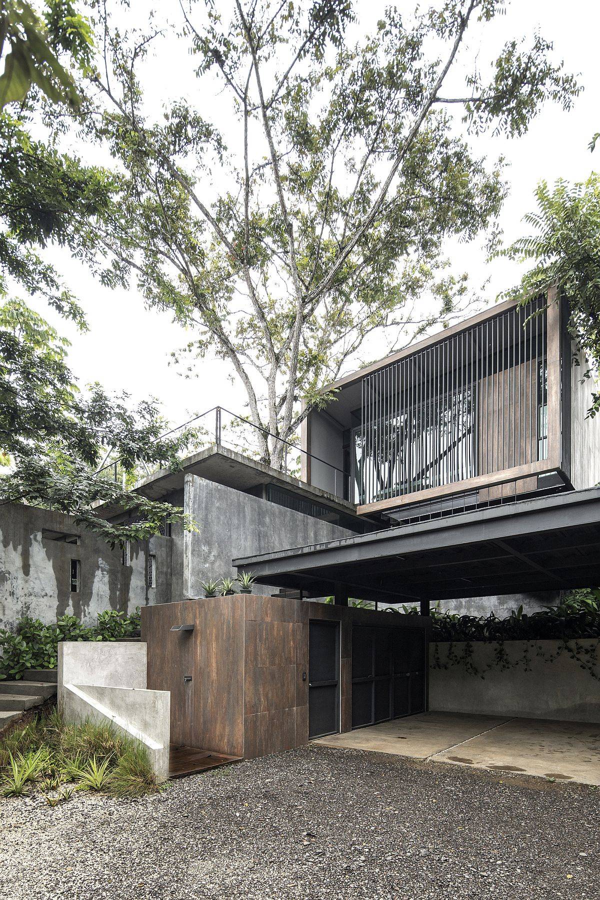 Brutalist design of the exterior was created to meet the specific needs of the homeowner