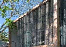 Custom-entry-of-the-home-combines-concrete-with-a-hint-of-wood-and-metal-33138-217x155