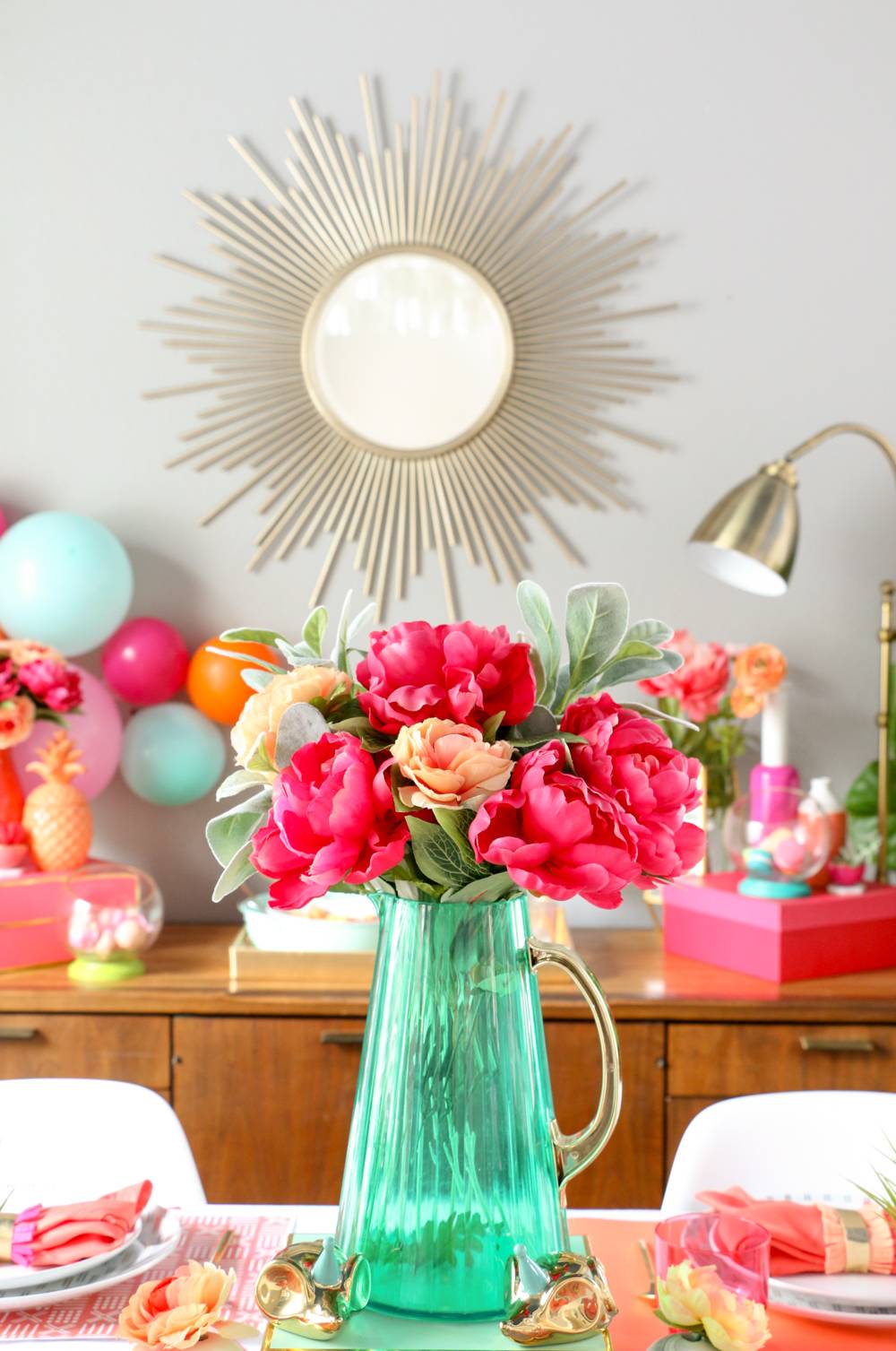 Colorful centerpiece with a blue pitcher (A Kailo Chic Life)