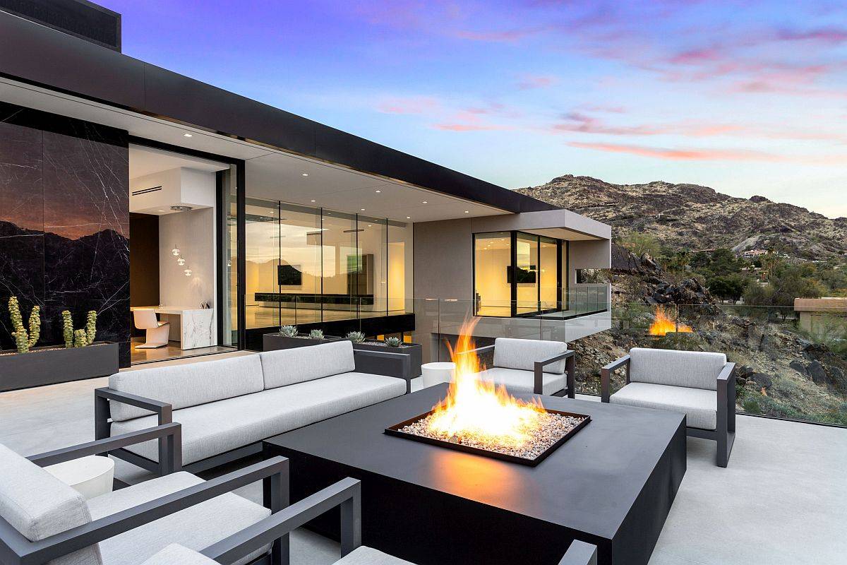 Outdoor-sitting-area-on-other-side-of-the-fireplace-seems-like-a-natural-extension-of-the-interior-76117