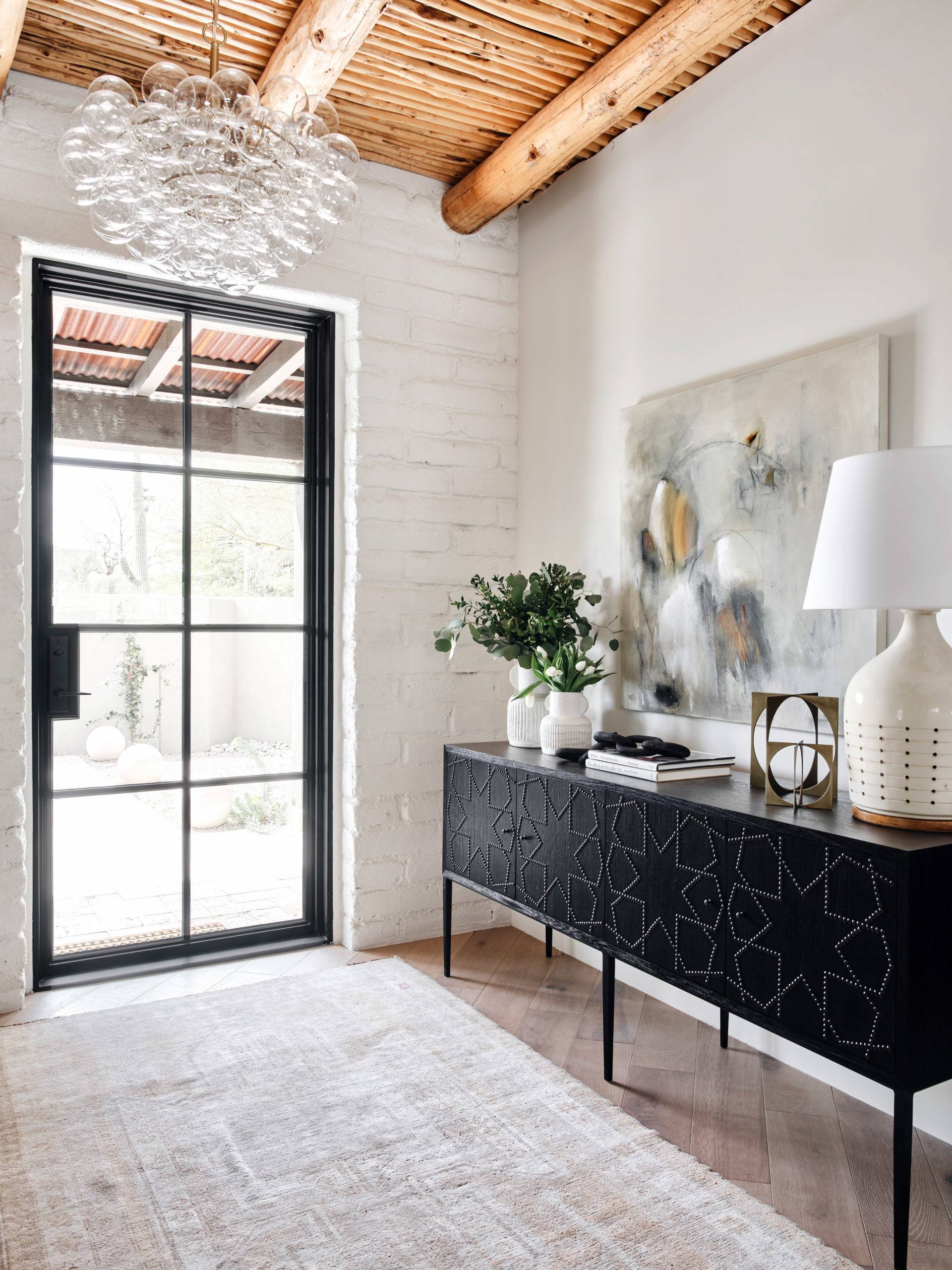 entryway to home with black marble table