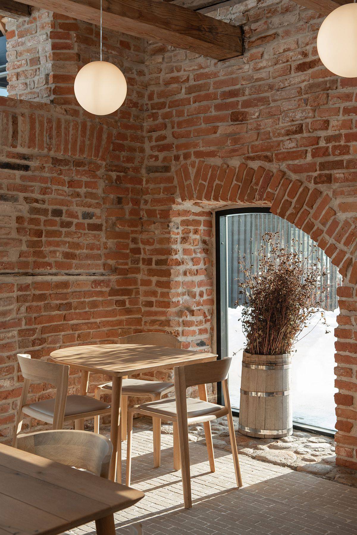 Smart brick walls and wooden beams welcome guests here