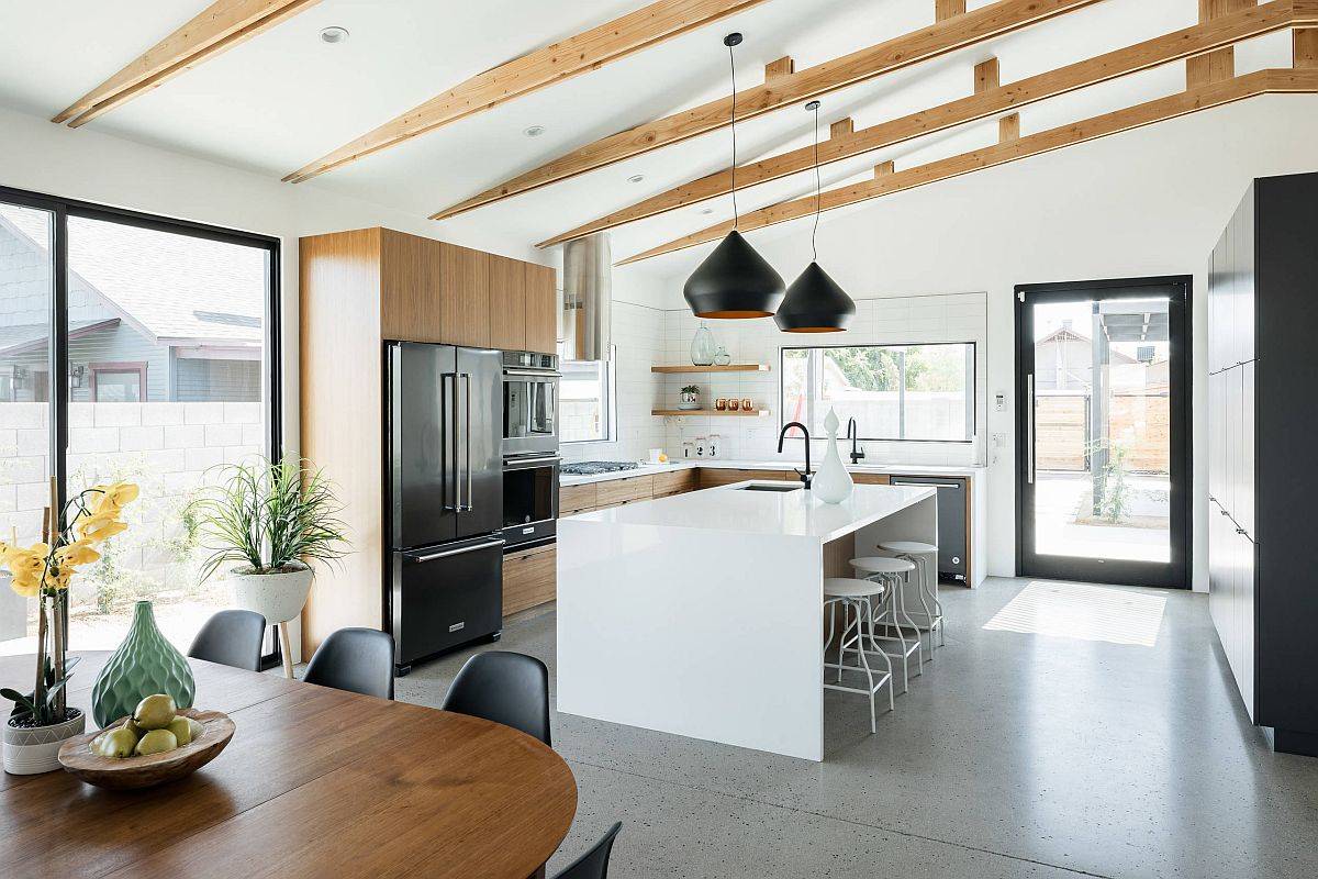 Sturdy concrete floor in the kitchen and dining area can withstand plenty of traffic