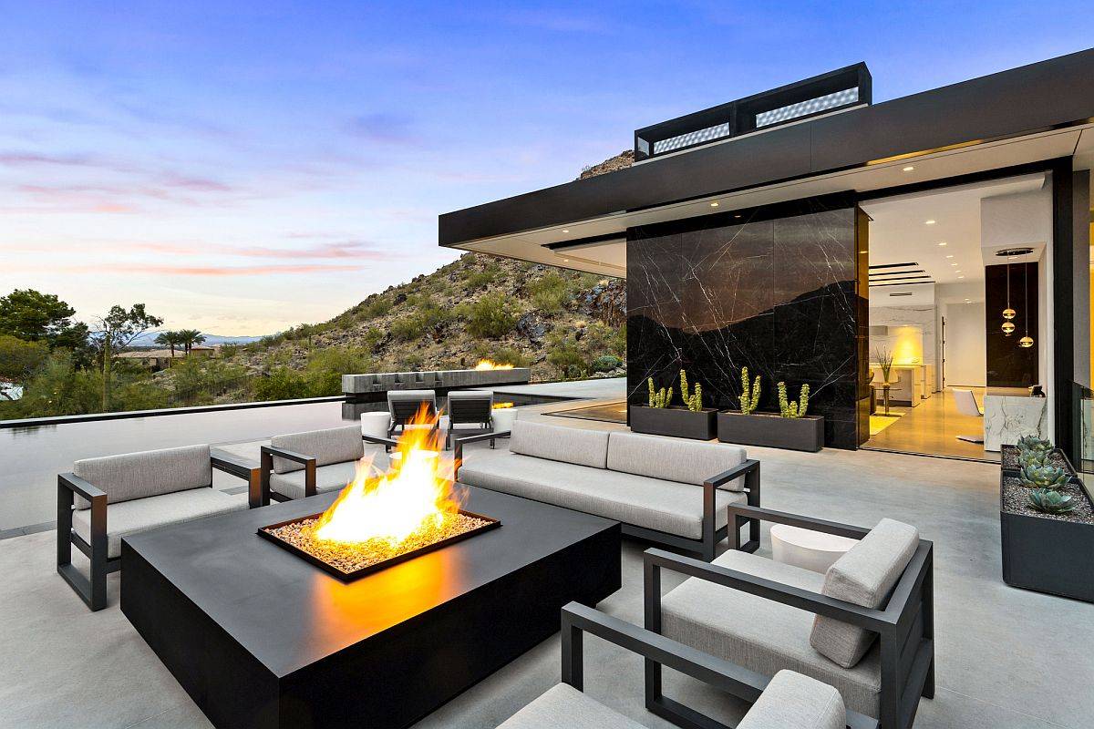 Vast, open landscape, distant hills and semi-arid scenery surround this beautiful valley home