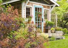 garden-shed-with-shake-siding-and-blue-painted-door-766b8dbe-40979-217x155