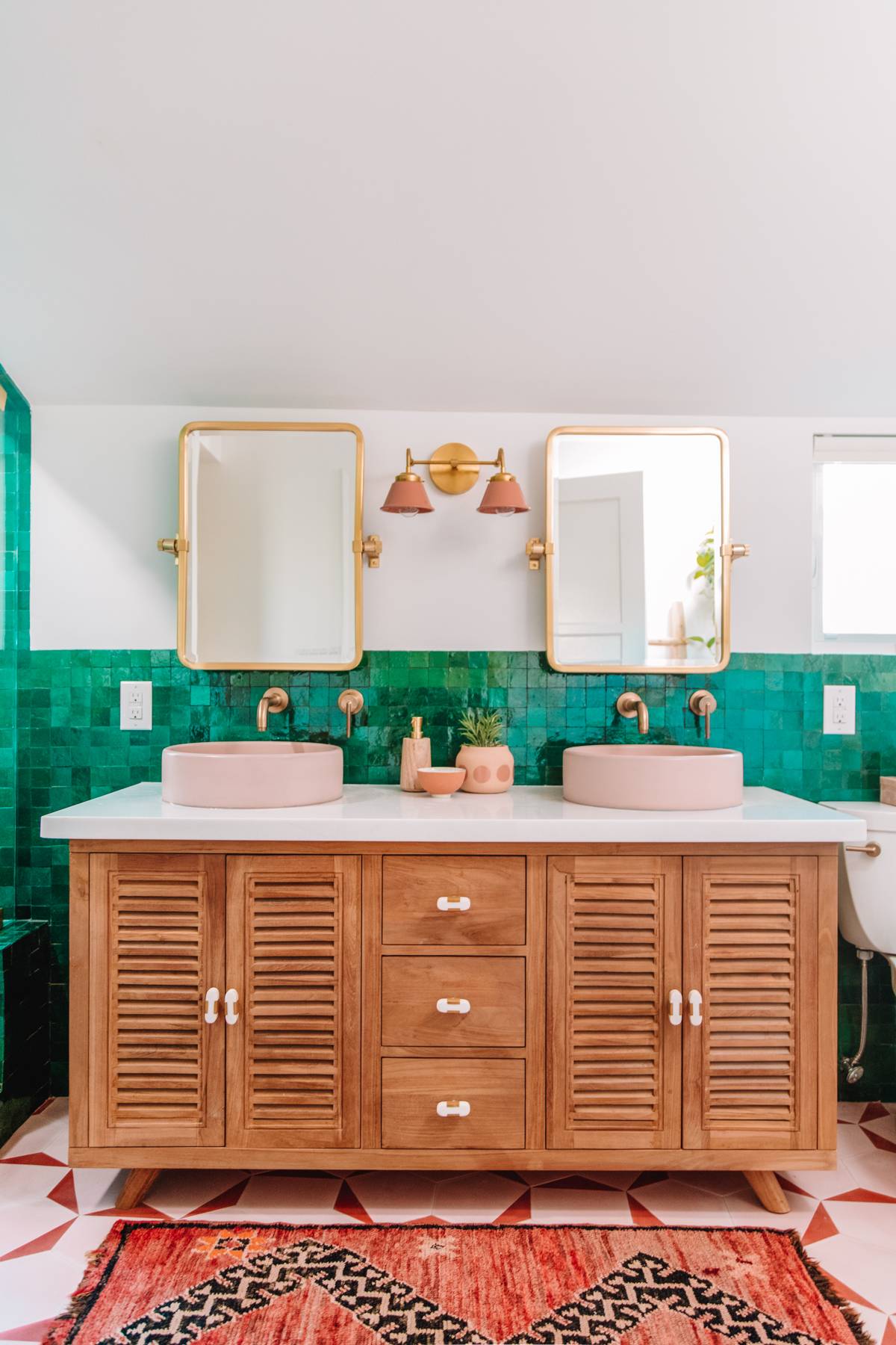 Pink Accents and Flooring in Master Bathroom Inspirations [Photo by Studio DIY]