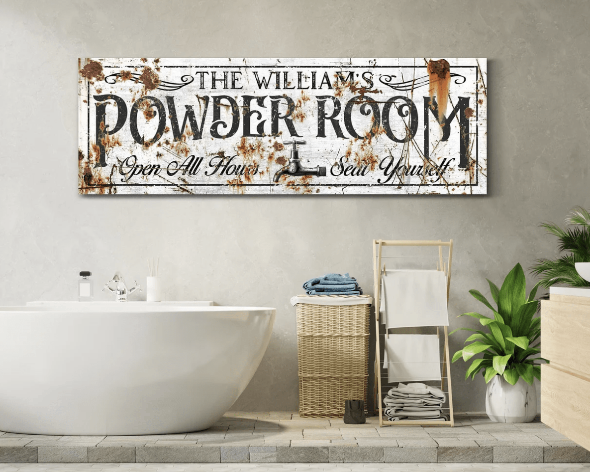 antique powder room rusty sign bathtub towel rack greenery