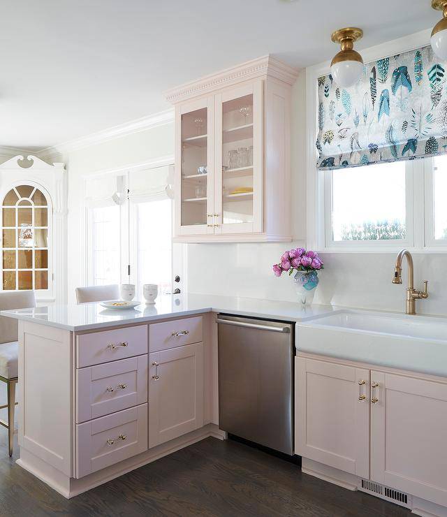 pink pastel kitchen cupboards white countertops