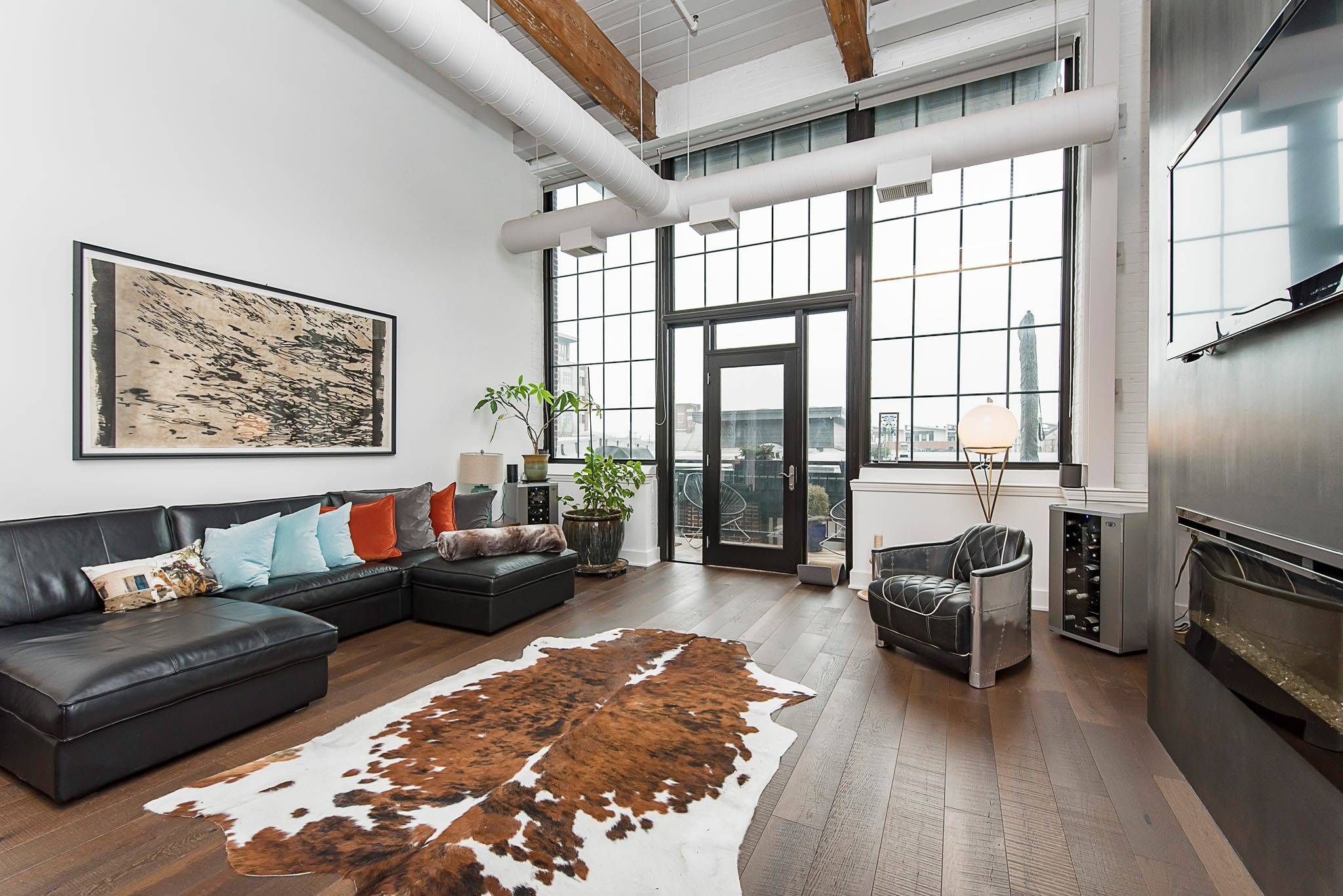 Cowhide rug adds style (from Houzz)