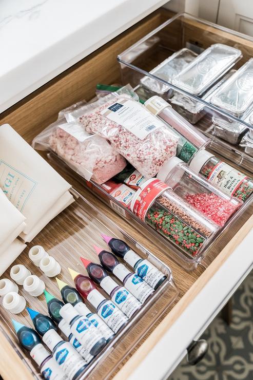 baking supplies in open drawer sprinkles food coloring close up