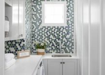 circle backsplash green and blue flush mount ceiling light white cabinetry sink white countertop