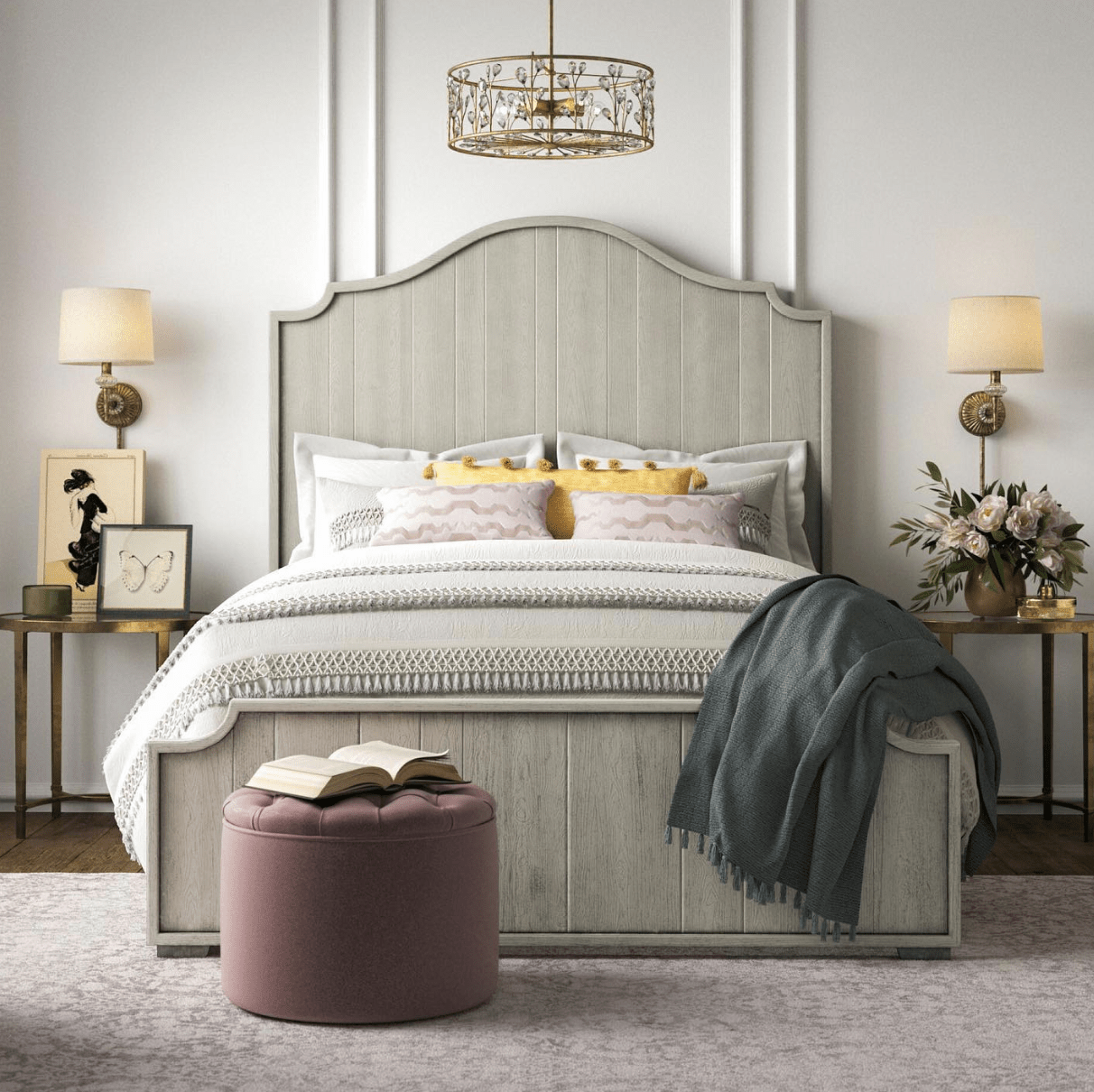 Large bed in primary bedroom grey with table lamps and nightstands