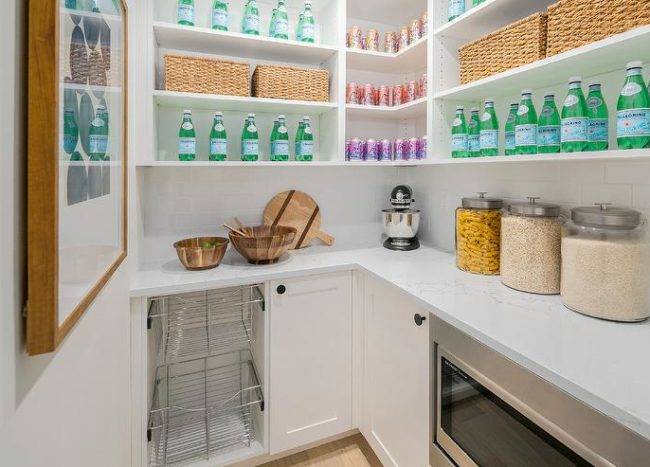 open shelving pantry sparkling water marble countertop baskets