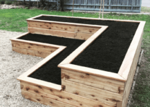 wood L shaped garden beds raised top soil empty