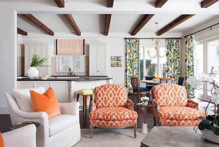 orange sitting chairs white chair pillow living room wood beams kitchen