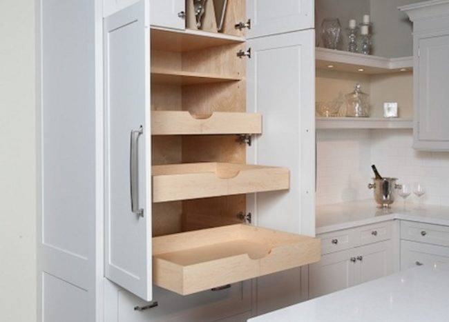 pull out shelves pantry cabinetry white kitchen