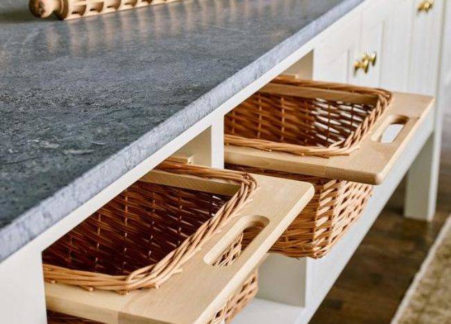 wood wicker baskets fruit and veggie storage under counter island in kitchen wood rolling pin copper bowls