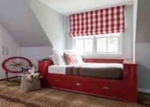 boys bedroom with red bed and brown carpet checkered pattern curtains window