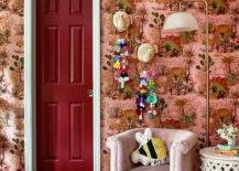 Red and Pink dinosaur wallpaper deep red door with white trim pink child's chair toys