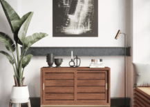 sideboard plant lamp and wall art wood