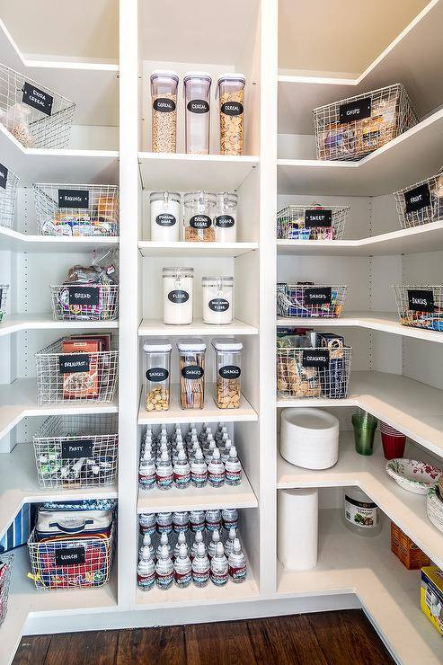 wide shot of pantry open shelving with wire baskets